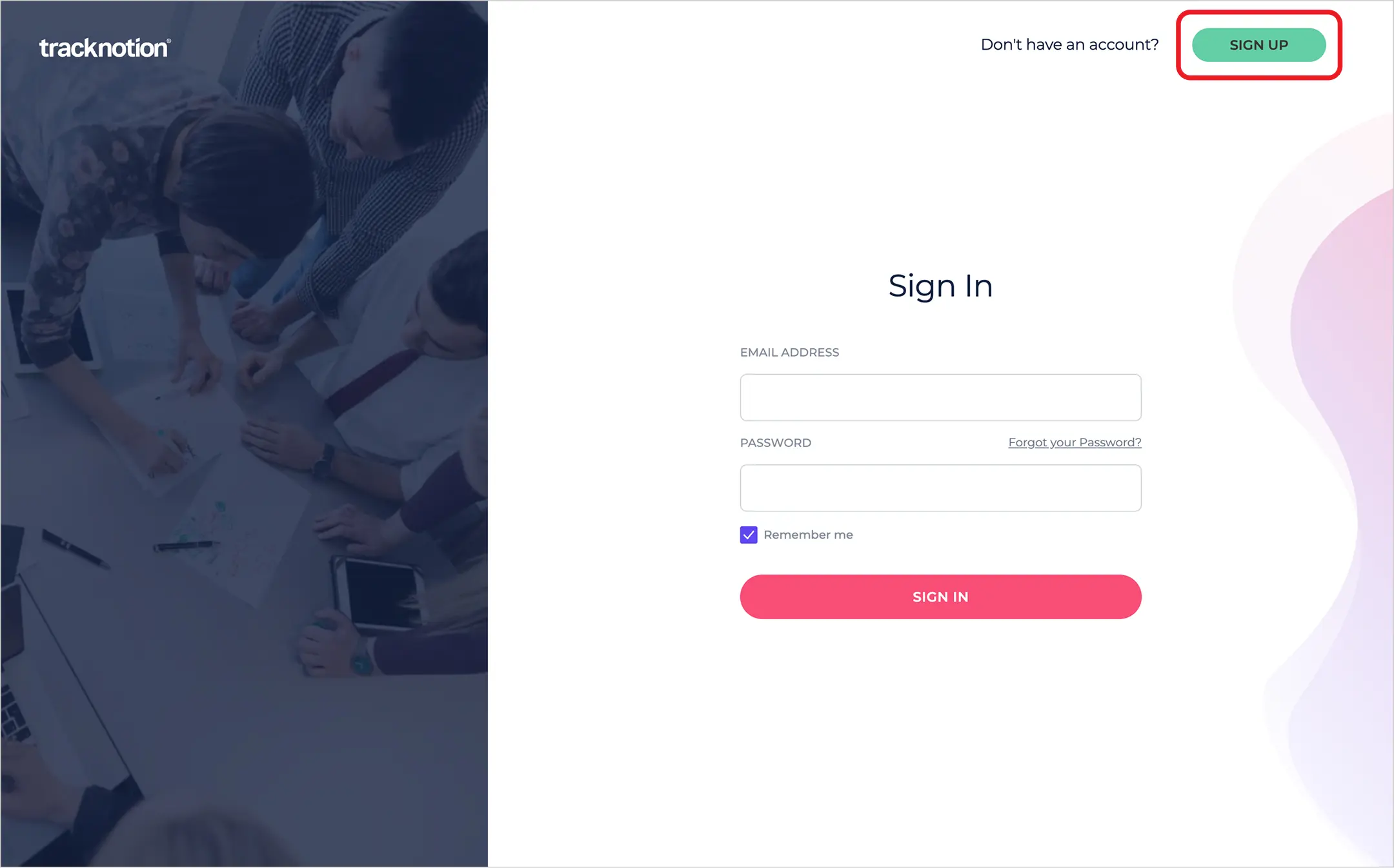 TrackNotion sign-in page with the SIGN UP button highlighted in the top-right corner